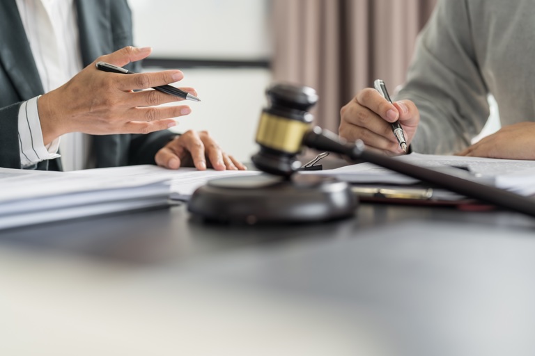 Lawyer,Legal,Counsel,Presents,To,The,Client,A,Signed,Contract